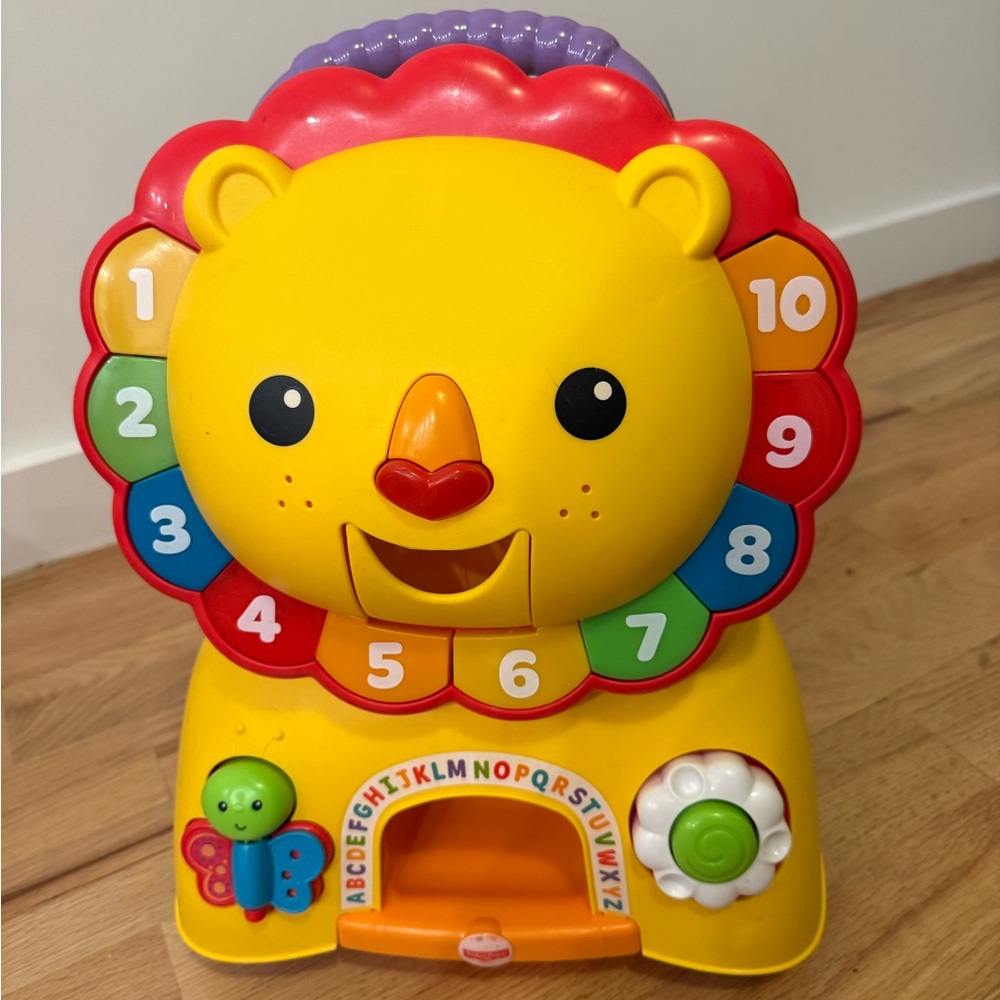 Fisher-Price 3-in-1 Sit, Stride & Ride Interactive Lion